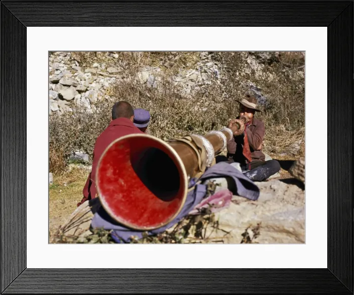 Framed Print : Blowing giant horn at Ganden Monastery, Tibet, China, Asia Framed Print : Blowing giant horn at Ganden Monastery, Tibet, China, Asia