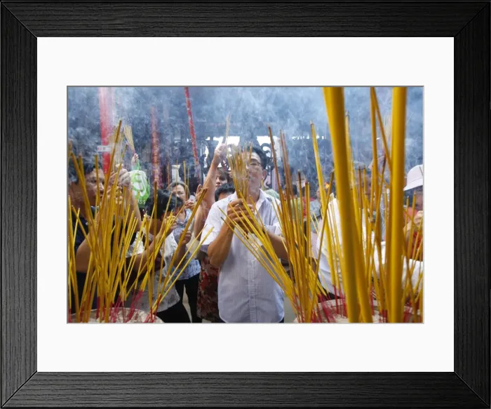 Framed Print : Burning incense during Tet, the Vietnamese lunar New Year celebration, Thien Hau Temple Framed Print : Burning incense during Tet, the Vietnamese lunar New Year celebration, Thien Hau Temple