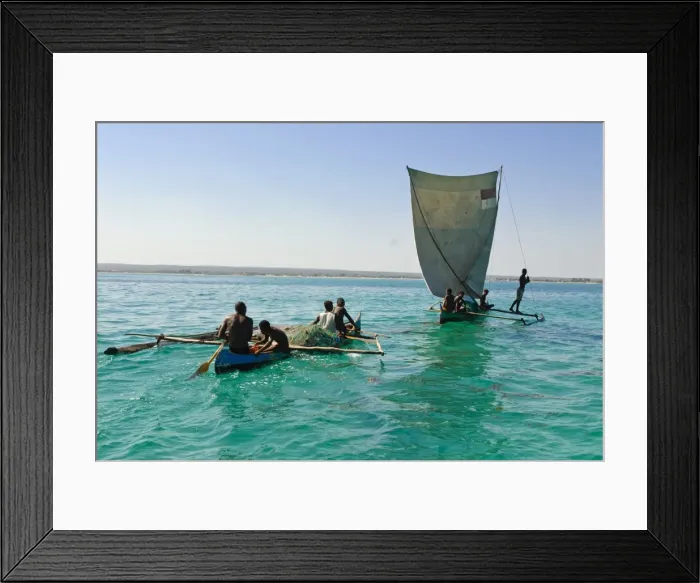 Framed Print : Traditional sailing boat and rowing boat in the turquoise water of the Indian Ocean