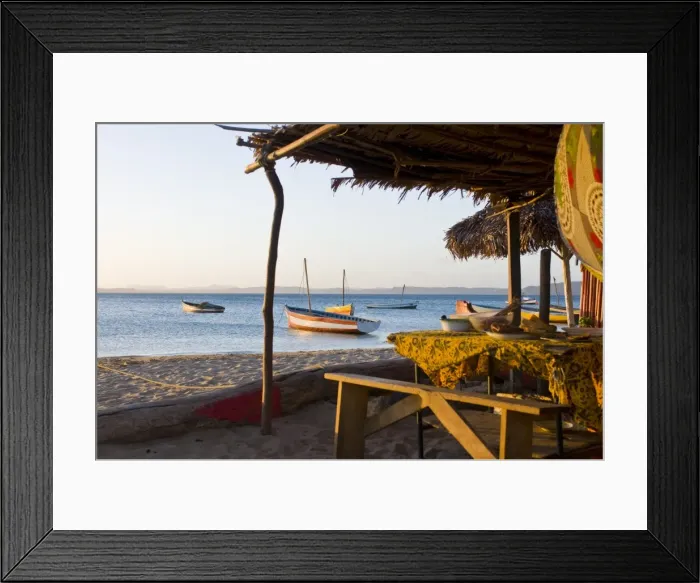 Framed Print : Beach cottage and fishing boats near Diego Suarez (Antsiranana), Madagascar Framed Print : Beach cottage and fishing boats near Diego Suarez (Antsiranana), Madagascar