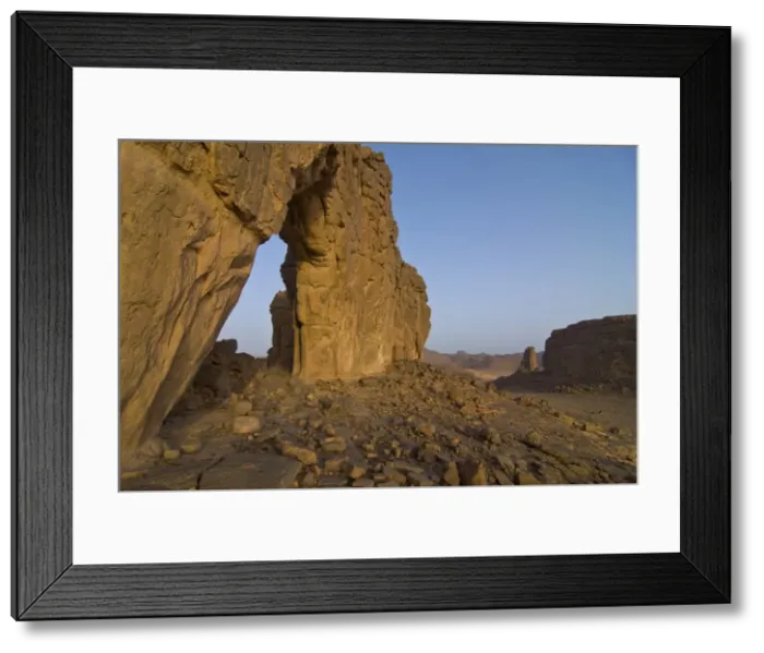 Framed Print : Giant rock arch in the region of Tasset, 250 km north of Djanet, Southern Algeria Framed Print : Giant rock arch in the region of Tasset, 250 km north of Djanet, Southern Algeria