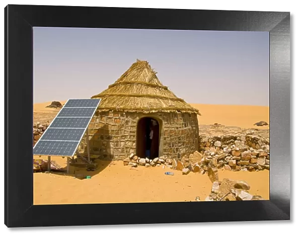 Traditional house with a solar panel in the Sahara Desert, Algeria, North Africa, Africa