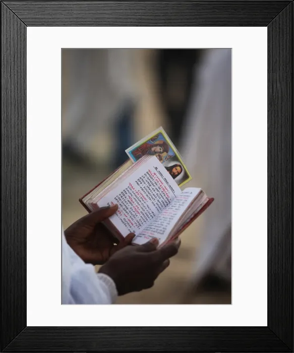 Framed Print : Pilgrim reading Bible in Amharic, Timkat festival, Gondar, Ethiopia, Africa Framed Print : Pilgrim reading Bible in Amharic, Timkat festival, Gondar, Ethiopia, Africa
