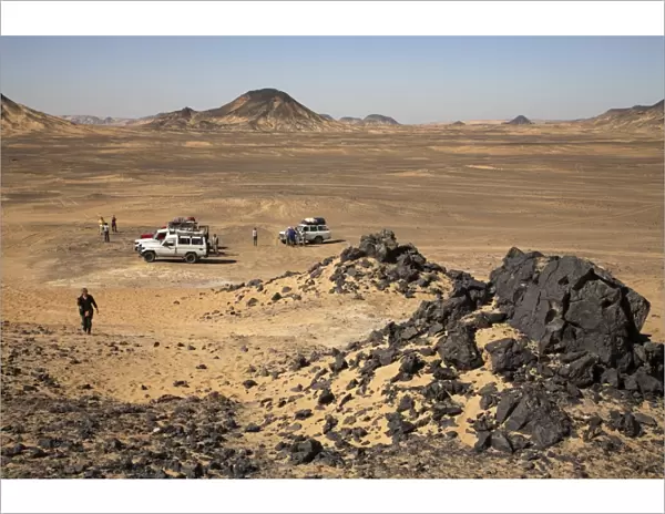 Tourist jeeps in the Black Desert, 50 km south of Bawiti, Egypt, North Africa, Africa