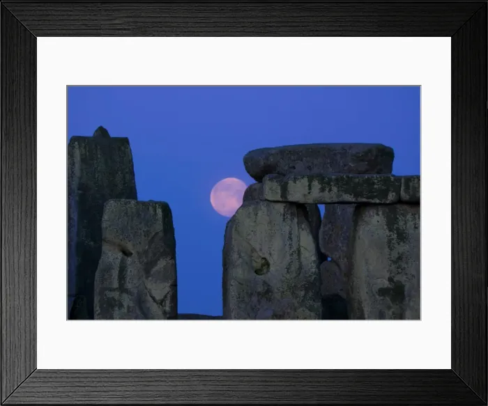 Framed Print : Moon behind Stonehenge, UNESCO World Heritage Site, Wiltshire, England Framed Print : Moon behind Stonehenge, UNESCO World Heritage Site, Wiltshire, England