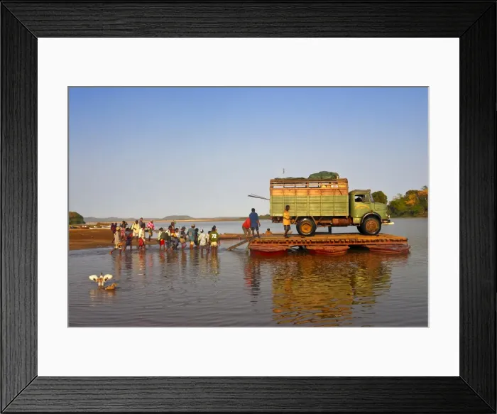 Framed Print : People and truck crossing the Manambolo River, Tsingy de Bemaraha, Madagascar, Africa Framed Print : People and truck crossing the Manambolo River, Tsingy de Bemaraha, Madagascar, Africa