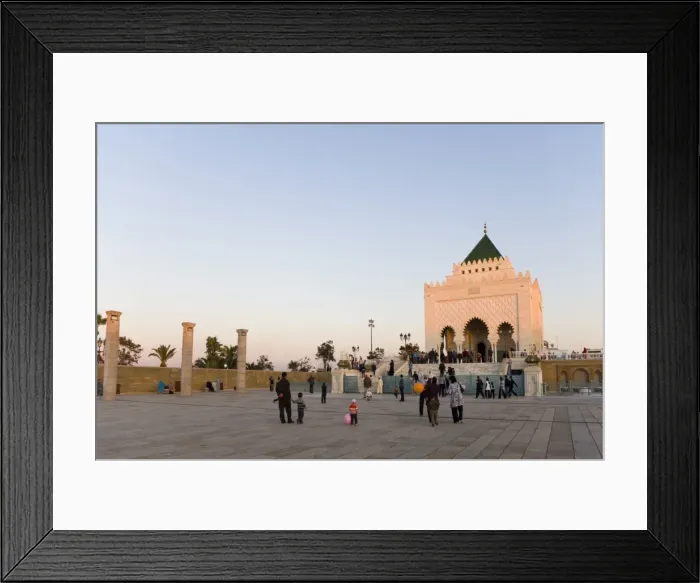 Framed Print : Visitors walk amongst the columns at The Unfinished Hassan Mosque, and the Mausoleum of Mohammed V Framed Print : Visitors walk amongst the columns at The Unfinished Hassan Mosque, and the Mausoleum of Mohammed V