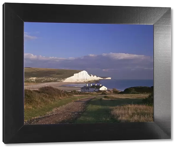White chalk cliffs of the Seven Sisters at Cuckmere Haven, seen from near Seaford