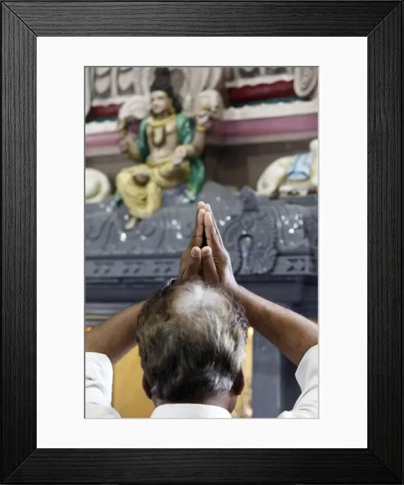 Framed Print : Hindu devotee praying in a Tamil temple, London, England, United Kingdom, Europe