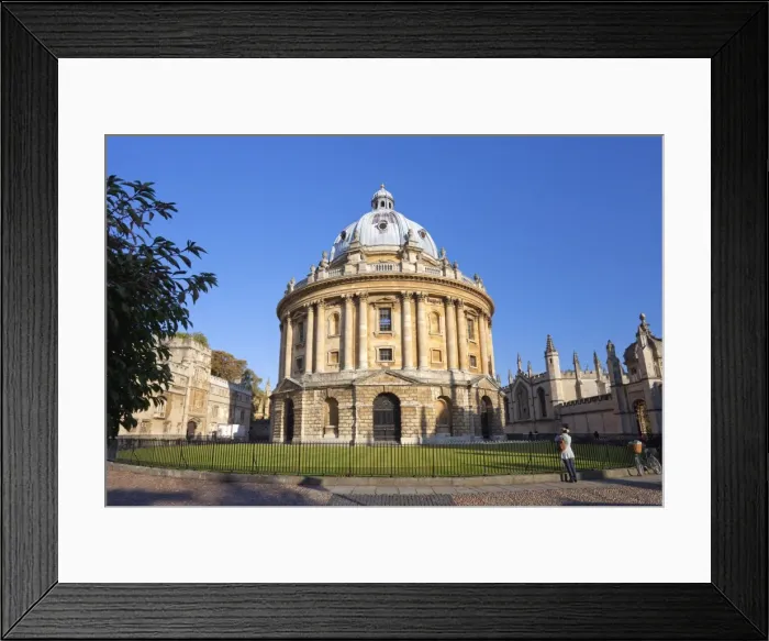 Framed Print : Student with bicycle in front of Radcliffe Camera and All Souls College Framed Print : Student with bicycle in front of Radcliffe Camera and All Souls College