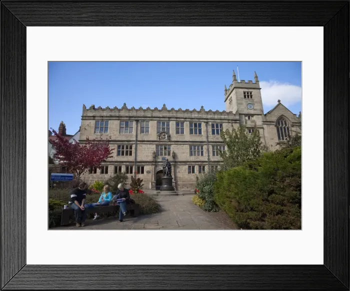Framed Print : Visitors sitting in front of Statue of Charles Darwin outside Public Library