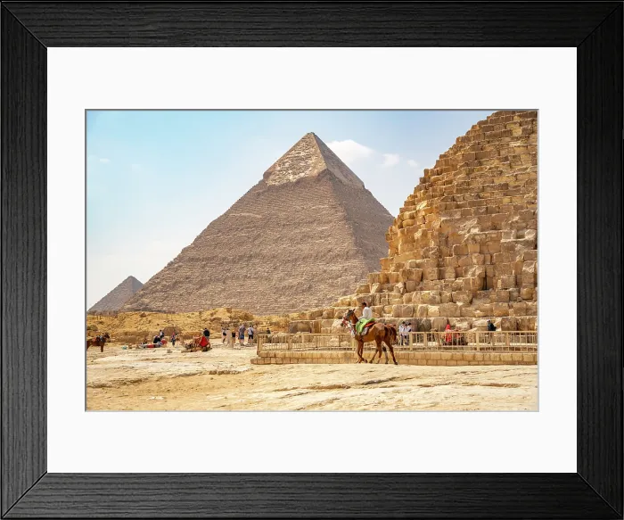 Framed Print : View of the Khafre Pyramid of Giza and a man on horseback on a sunny day, Giza, Cairo, Egypt, Africa Framed Print : View of the Khafre Pyramid of Giza and a man on horseback on a sunny day, Giza, Cairo, Egypt, Africa