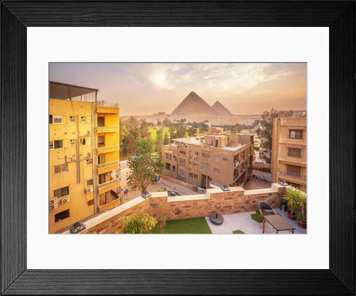 Framed Print : View of the Giza Pyramids from rooftop terrace during golden hour, Giza, Cairo, Egypt, Africa Framed Print : View of the Giza Pyramids from rooftop terrace during golden hour, Giza, Cairo, Egypt, Africa