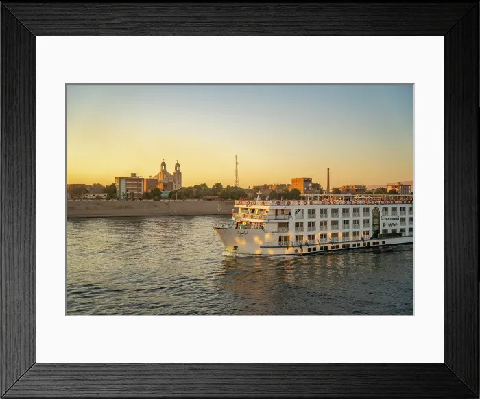 Framed Print : View of cruise boats from cruise boat near Esna on the Nile River at sunset, Esna, Egypt, Africa Framed Print : View of cruise boats from cruise boat near Esna on the Nile River at sunset, Esna, Egypt, Africa