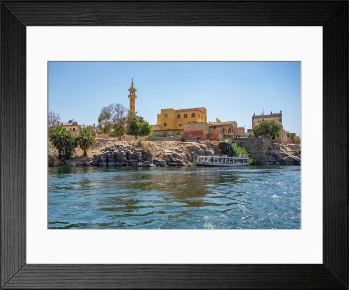 Framed Print : View of architecture on the Nile river from small boat in Aswan, Aswan, Nubia, Egypt, North Africa, Africa Framed Print : View of architecture on the Nile river from small boat in Aswan, Aswan, Nubia, Egypt, North Africa, Africa