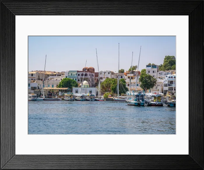 Framed Print : View of feluccas on the Nile river from small boat in Aswan, Aswan, Nubia, Egypt, North Africa, Africa Framed Print : View of feluccas on the Nile river from small boat in Aswan, Aswan, Nubia, Egypt, North Africa, Africa