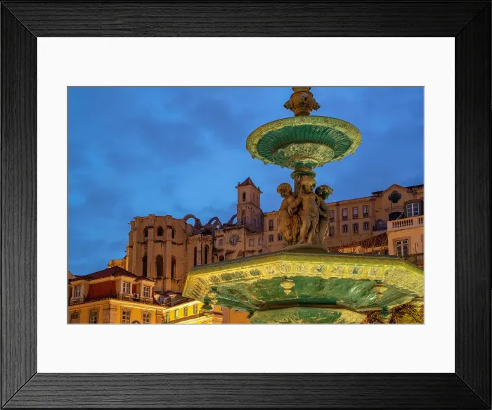 Framed Print : View of South fountain of Rossio in Praca do Rossio and Carmo Archaeological Museum at dusk, Lisbon, Portugal, Europe Framed Print : View of South fountain of Rossio in Praca do Rossio and Carmo Archaeological Museum at dusk, Lisbon, Portugal, Europe
