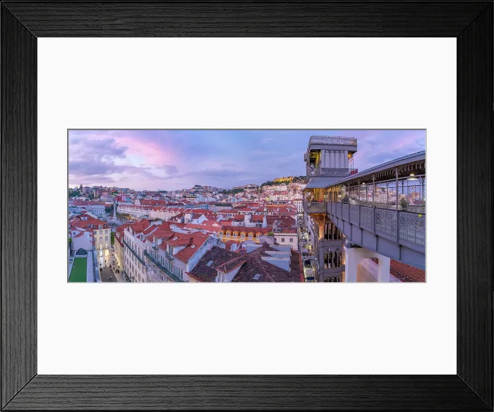 Framed Print : View of city rooftops and Santa Justa Lift from Carmo Archaeological Museum at dusk, Lisbon, Portugal, Europe Framed Print : View of city rooftops and Santa Justa Lift from Carmo Archaeological Museum at dusk, Lisbon, Portugal, Europe