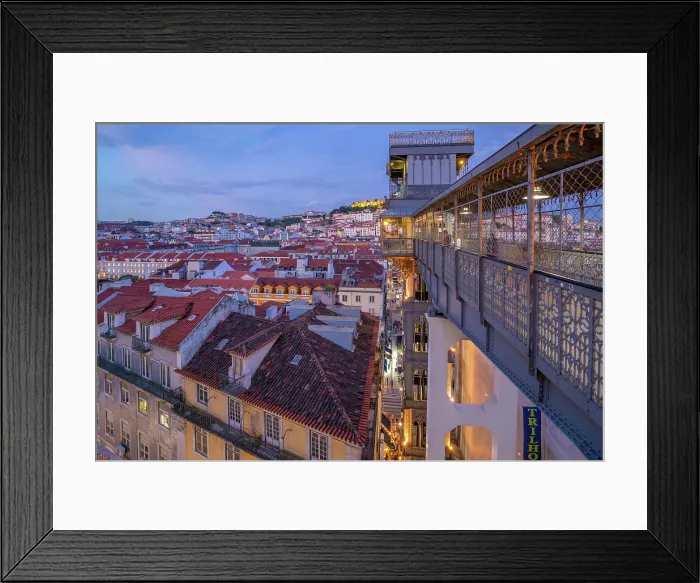 Framed Print : View of city rooftops and Santa Justa Lift from Carmo Archaeological Museum at dusk, Lisbon, Portugal, Europe Framed Print : View of city rooftops and Santa Justa Lift from Carmo Archaeological Museum at dusk, Lisbon, Portugal, Europe