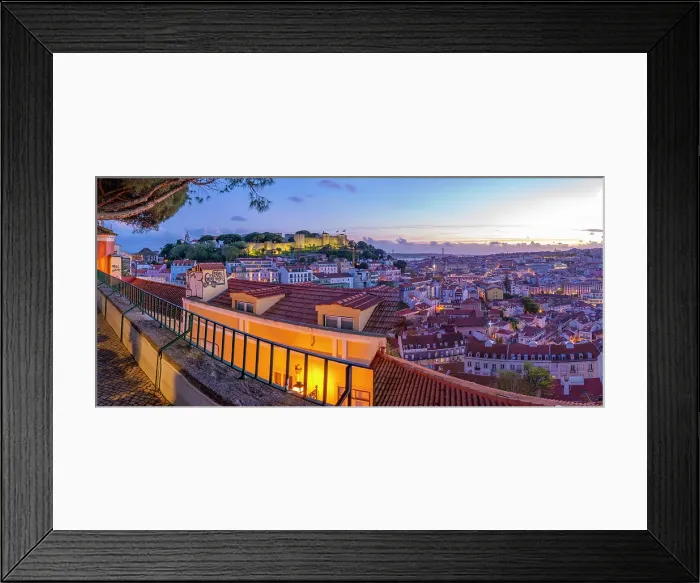 Framed Print : Panoramic view of Lisbon Castle from Miradouro da Senhora do Monte scenic point at dusk in the Alfama District, Lisbon, Portugal, Europe