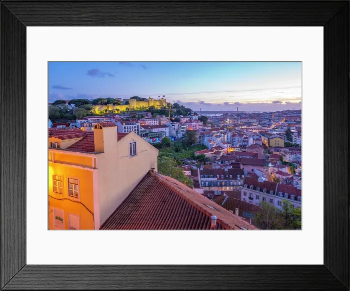 Framed Print : Panoramic view of Lisbon Castle from Miradouro da Senhora do Monte scenic point at dusk in the Alfama District, Lisbon, Portugal, Europe