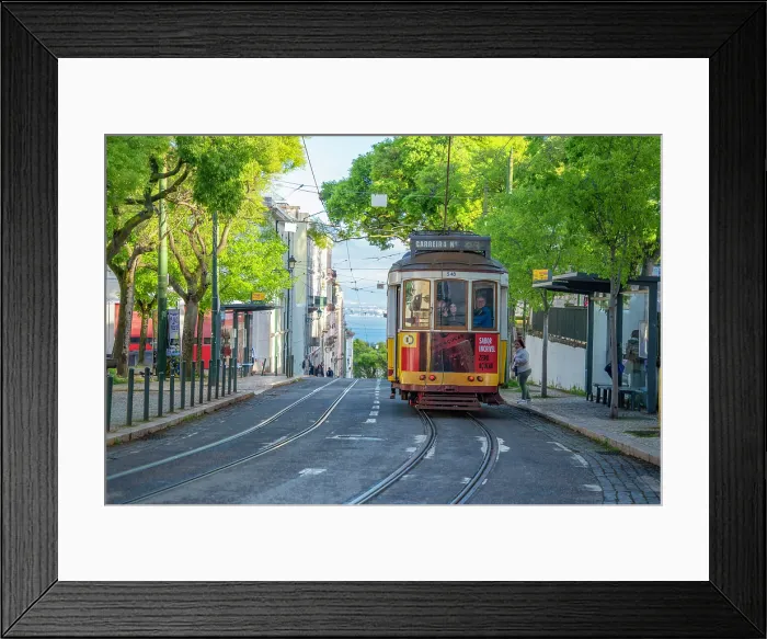 Framed Print : View of vintage tram and colourful buildings in the Alfama District on a sunny day, Lisbon, Portugal, Europe