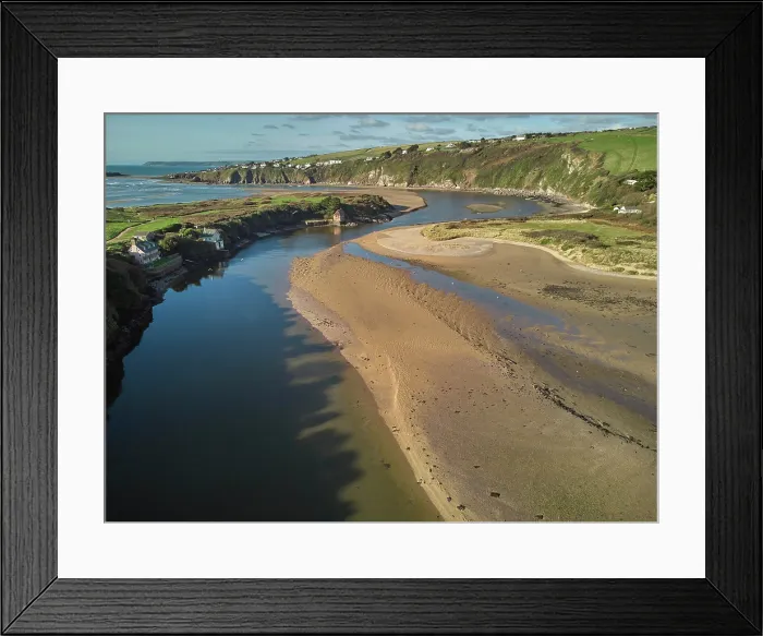 Framed Print : A low tide aerial drone view of the sandy shore and sand banks in the estuary of the River Avon, at Bantham, on the south coast of Devon, Great Britain Framed Print : A low tide aerial drone view of the sandy shore and sand banks in the estuary of the River Avon, at Bantham, on the south coast of Devon, Great Britain