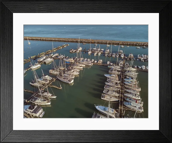 Framed Print : An aerial drone view of boats moored in the marina at Brixham, in Torbay, Devon, Great Britain Framed Print : An aerial drone view of boats moored in the marina at Brixham, in Torbay, Devon, Great Britain