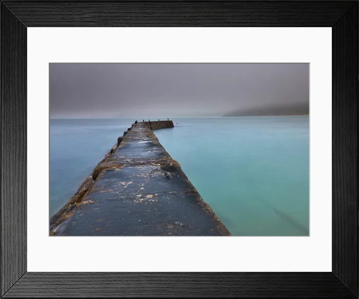 Framed Print : A misty, murky dawn view of the breakwater at Sennen Cove; on the Atlantic coast near Land's End, in the far west of Cornwall, Great Britain Framed Print : A misty, murky dawn view of the breakwater at Sennen Cove; on the Atlantic coast near Land's End, in the far west of Cornwall, Great Britain