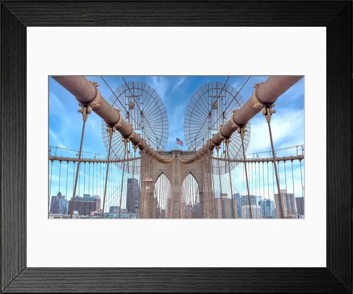 Framed Print : Brooklyn Bridge, New York City, spanning the East River between Manhattan and Brooklyn. When built in 1883 it was the longest suspension bridge in the world Framed Print : Brooklyn Bridge, New York City, spanning the East River between Manhattan and Brooklyn. When built in 1883 it was the longest suspension bridge in the world