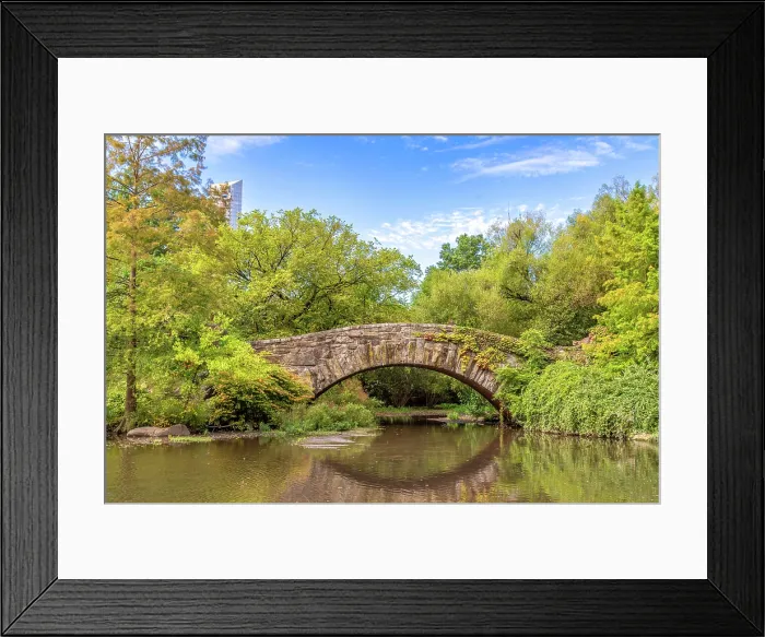 Framed Print : The Gapstow Bridge across the Pond in Central Park, Manhattan, New York City. It was built of stone in 1896 Framed Print : The Gapstow Bridge across the Pond in Central Park, Manhattan, New York City. It was built of stone in 1896