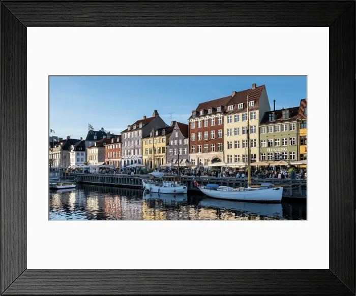 Framed Print : Copenhagen, Denmark ' View of Nyhavn (New Haven), a 17th-century waterfront and canal lined with colorful historic townhouses, cafes, and wooden ships Framed Print : Copenhagen, Denmark ' View of Nyhavn (New Haven), a 17th-century waterfront and canal lined with colorful historic townhouses, cafes, and wooden ships