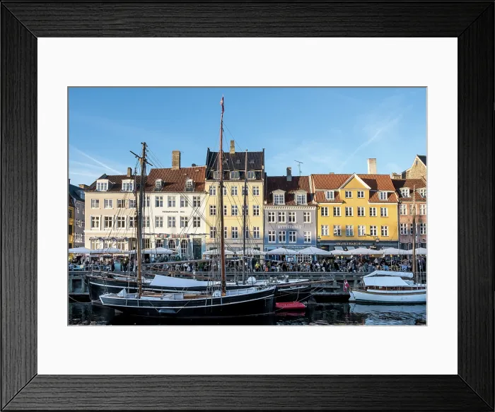 Framed Print : Copenhagen, Denmark ' View of Nyhavn (New Haven), a 17th-century waterfront and canal lined with colorful historic townhouses, cafes, and wooden ships Framed Print : Copenhagen, Denmark ' View of Nyhavn (New Haven), a 17th-century waterfront and canal lined with colorful historic townhouses, cafes, and wooden ships