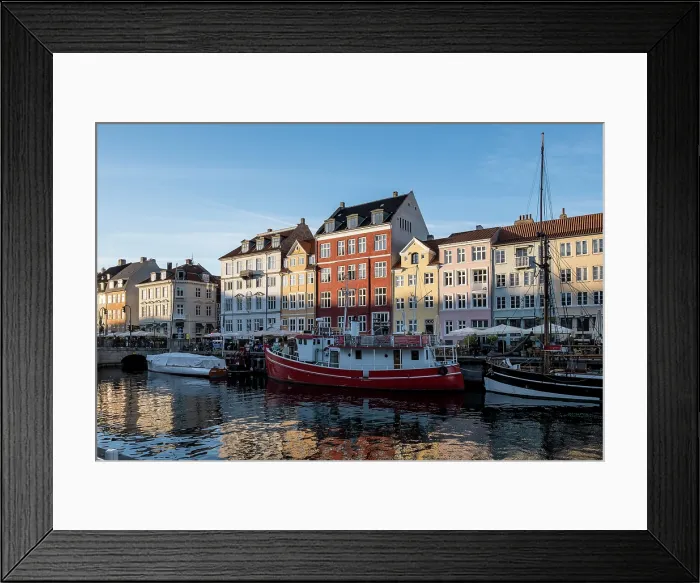 Framed Print : Copenhagen, Denmark ' View of Nyhavn (New Haven), a 17th-century waterfront and canal lined with colorful historic townhouses, cafes, and wooden ships Framed Print : Copenhagen, Denmark ' View of Nyhavn (New Haven), a 17th-century waterfront and canal lined with colorful historic townhouses, cafes, and wooden ships