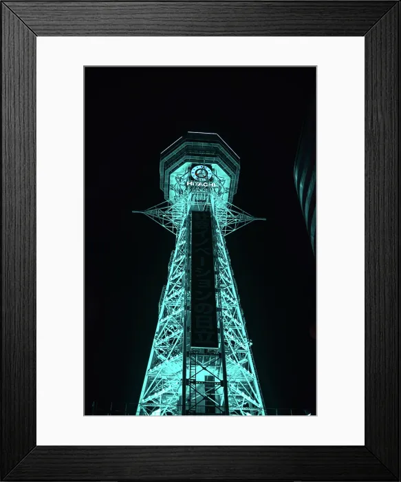 Framed Print : Osaka Tsutenkaku tower in the Shinsekai district. Illuminated turquoise night lights. Japan Framed Print : Osaka Tsutenkaku tower in the Shinsekai district. Illuminated turquoise night lights. Japan