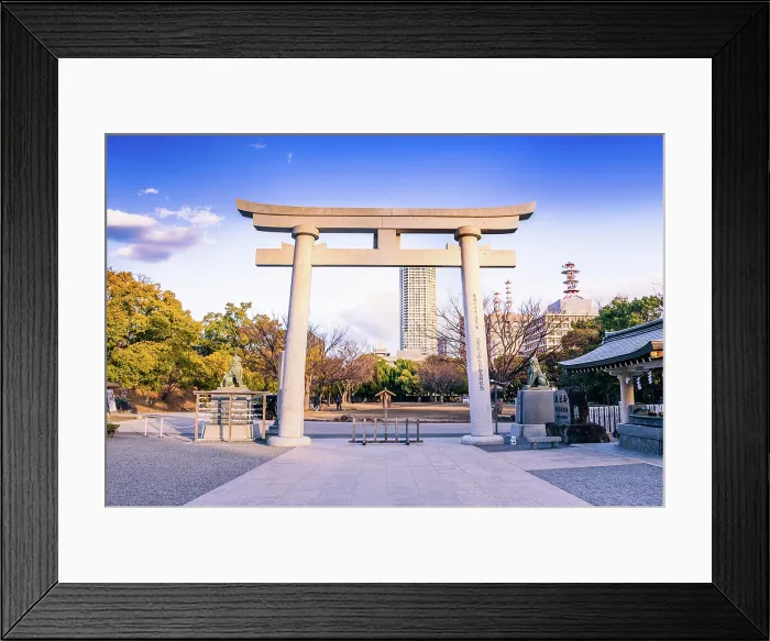 Framed Print : Stone Torii Gate at the Shinto shrine. Evening light at Hiroshima Gokoku Shrine, Hiroshima, Japan
