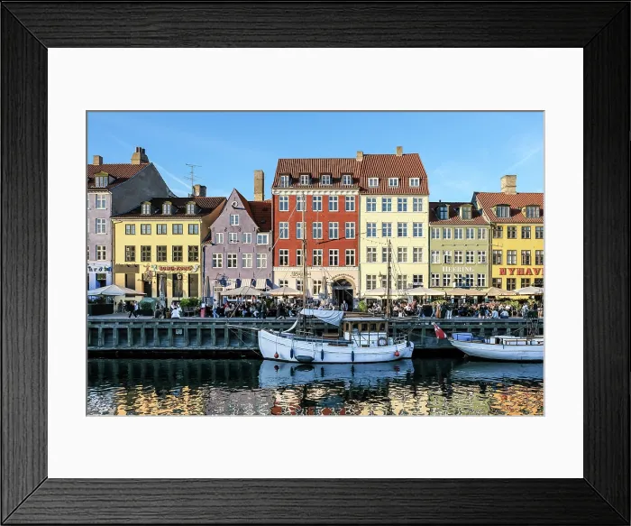 Framed Print : Copenhagen, Denmark ' View of Nyhavn (New Haven), a 17th-century waterfront and canal lined with colorful historic townhouses, cafes, and wooden ships Framed Print : Copenhagen, Denmark ' View of Nyhavn (New Haven), a 17th-century waterfront and canal lined with colorful historic townhouses, cafes, and wooden ships