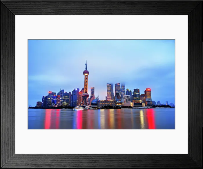 Framed Print : The iconic Lujiazui skyline shrouded in fog at dusk, Shanghai, China. Lujiazui is the financial district of Shanghai Framed Print : The iconic Lujiazui skyline shrouded in fog at dusk, Shanghai, China. Lujiazui is the financial district of Shanghai