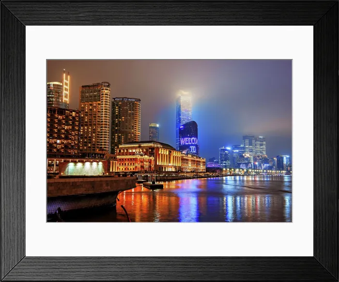 Framed Print : Brightly lit Shanghai city view at night shrouded in mist at the Bund, Shanghai, China. The low rise buildings are The Grand Halls which were previously warehouses built in 1902 Framed Print : Brightly lit Shanghai city view at night shrouded in mist at the Bund, Shanghai, China. The low rise buildings are The Grand Halls which were previously warehouses built in 1902
