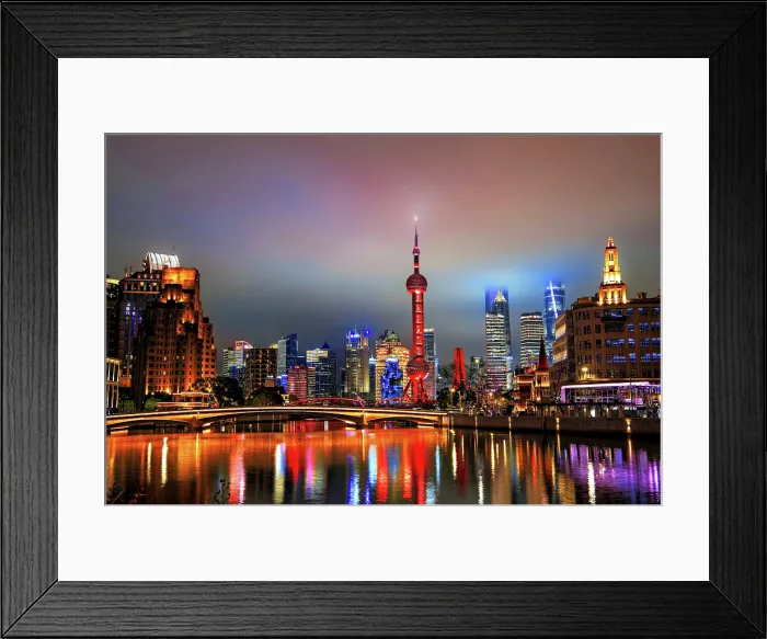 Framed Print : Brightly lit skyline of Lujiazui at night covered in mist viewed from Suzhou Creek in Shanghai, China Framed Print : Brightly lit skyline of Lujiazui at night covered in mist viewed from Suzhou Creek in Shanghai, China