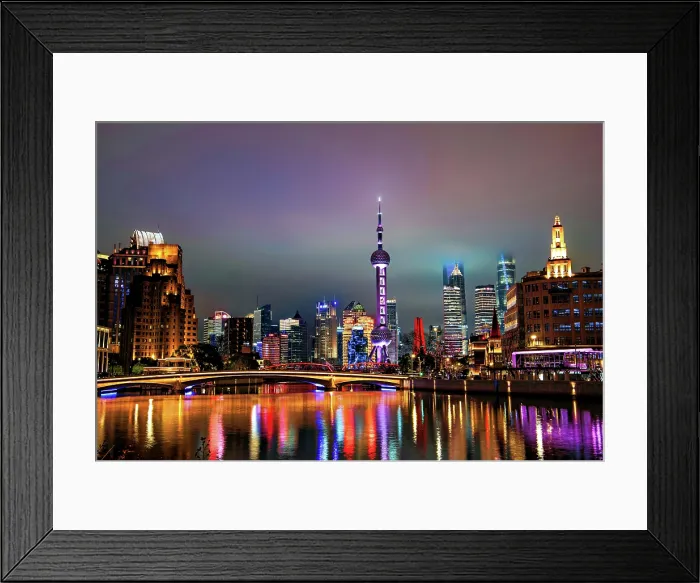 Framed Print : Brightly lit skyline of Lujiazui at night covered in mist viewed from Suzhou Creek in Shanghai, China Framed Print : Brightly lit skyline of Lujiazui at night covered in mist viewed from Suzhou Creek in Shanghai, China