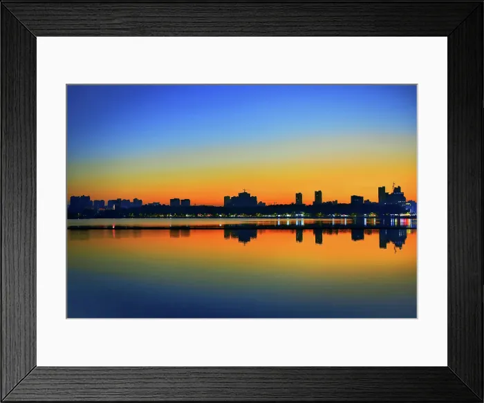 Framed Print : Sunset silhouette of Jiujiang City over Bali Lake, Jiangxi Province, China Framed Print : Sunset silhouette of Jiujiang City over Bali Lake, Jiangxi Province, China