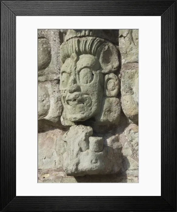 Framed Print : Stone sculptured face of the God of the Underworld, East Court, Copan Archaeological Park Framed Print : Stone sculptured face of the God of the Underworld, East Court, Copan Archaeological Park