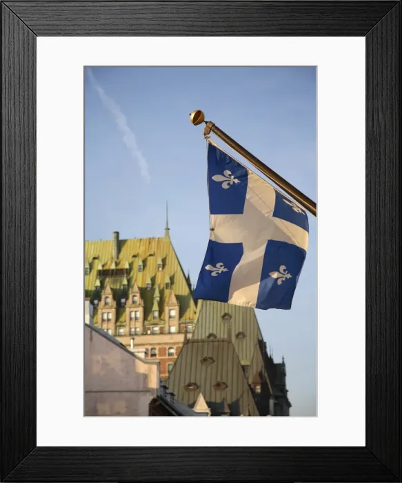 Framed Print : Quebec flag in foreground in front of rooftops of Chateau Frontenac, Quebec City Framed Print : Quebec flag in foreground in front of rooftops of Chateau Frontenac, Quebec City