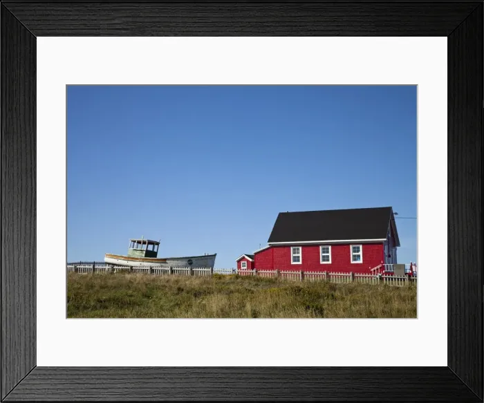 Framed Print : Maritime house painted red with boat on lawn, Iles de la Madeleine (Magdalen Islands) Framed Print : Maritime house painted red with boat on lawn, Iles de la Madeleine (Magdalen Islands)