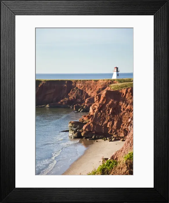 Framed Print : Lighthouse on a cliff overlooking a sandy beach on Havre-Aubert Island in the Iles de la Madeleine Framed Print : Lighthouse on a cliff overlooking a sandy beach on Havre-Aubert Island in the Iles de la Madeleine