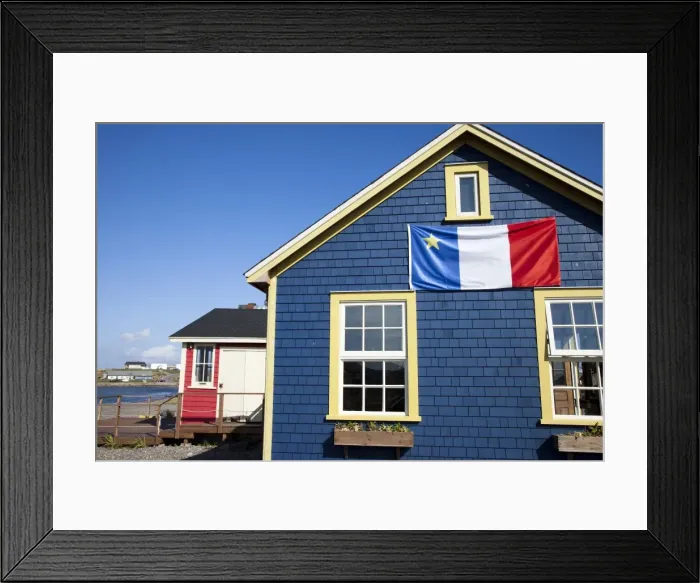Framed Print : Acadian flag on blue house in La Grave, Ile Havre-Aubert, one of the Iles de la Madeleine Framed Print : Acadian flag on blue house in La Grave, Ile Havre-Aubert, one of the Iles de la Madeleine