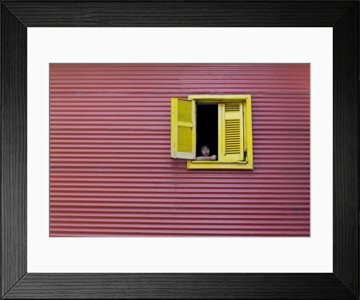 Framed Print : Child at a window, La Boca, Buenos Aires, Argentina, South America Framed Print : Child at a window, La Boca, Buenos Aires, Argentina, South America