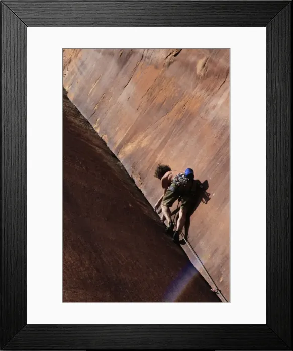 Framed Print : A climber tackles an overhanging corner on the cliffs of Indian Creek, a famous rock climbing area near Moab, Utah, United States of America Framed Print : A climber tackles an overhanging corner on the cliffs of Indian Creek, a famous rock climbing area near Moab, Utah, United States of America