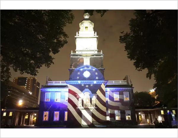 Independence Hall illuminated at night with sound and light show in Philadelphia